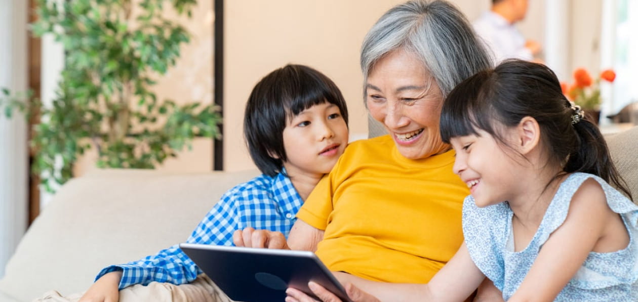 mother reviewing her solar benefits with children